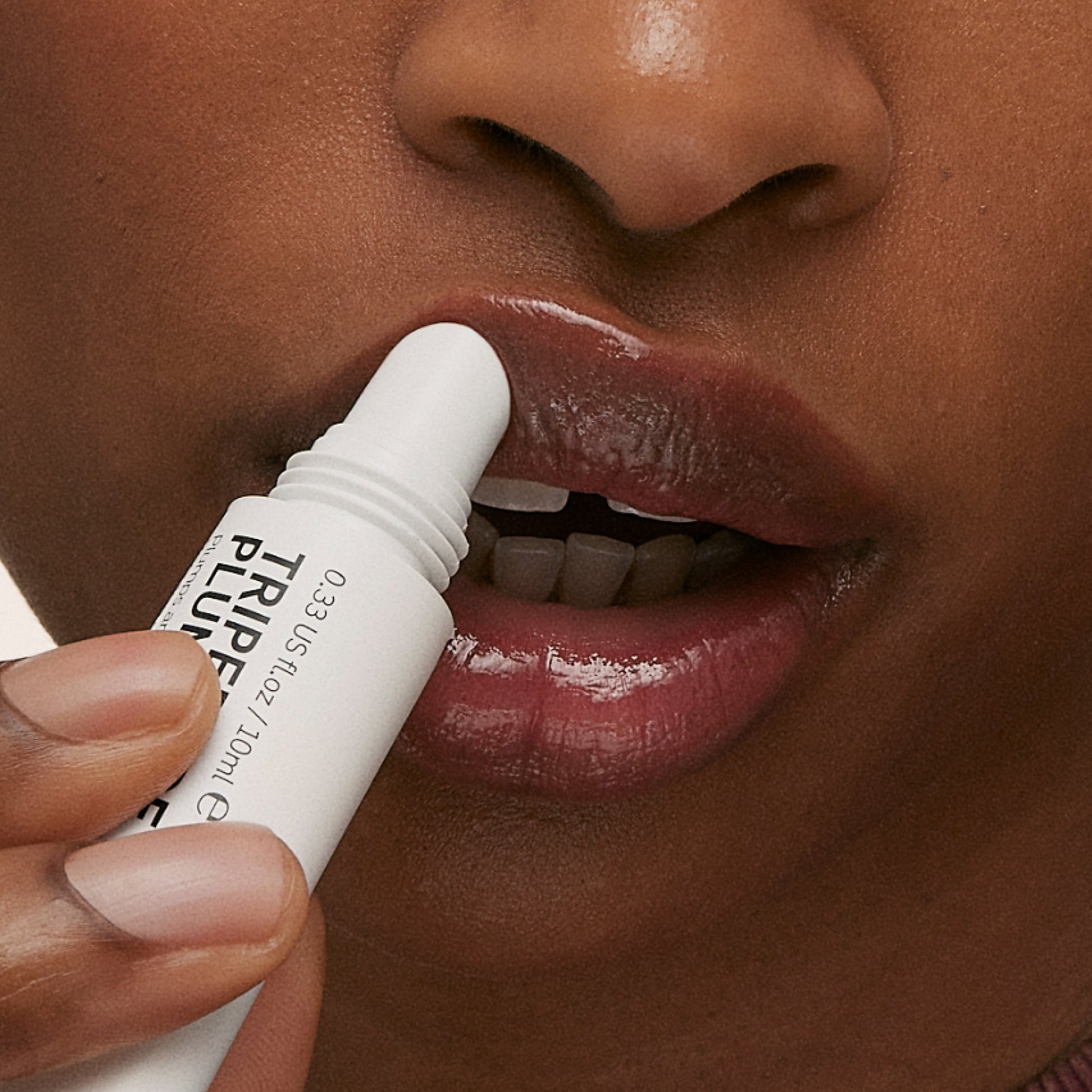 tripeptide-plumping-berry-lip-balm-r2 ApplicationBerry.jpg